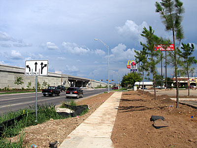 A view of the access road next to the freeway.