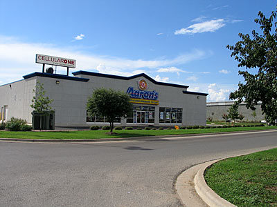 A view of Aaron's located in front of Wal-Mart.