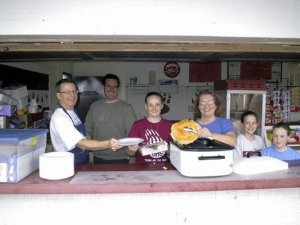 Bastrop Noon Lion's Club serves free Pancake Breakfast for the overnight campers